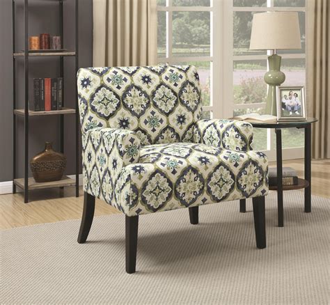 green upholstered accent chairs.